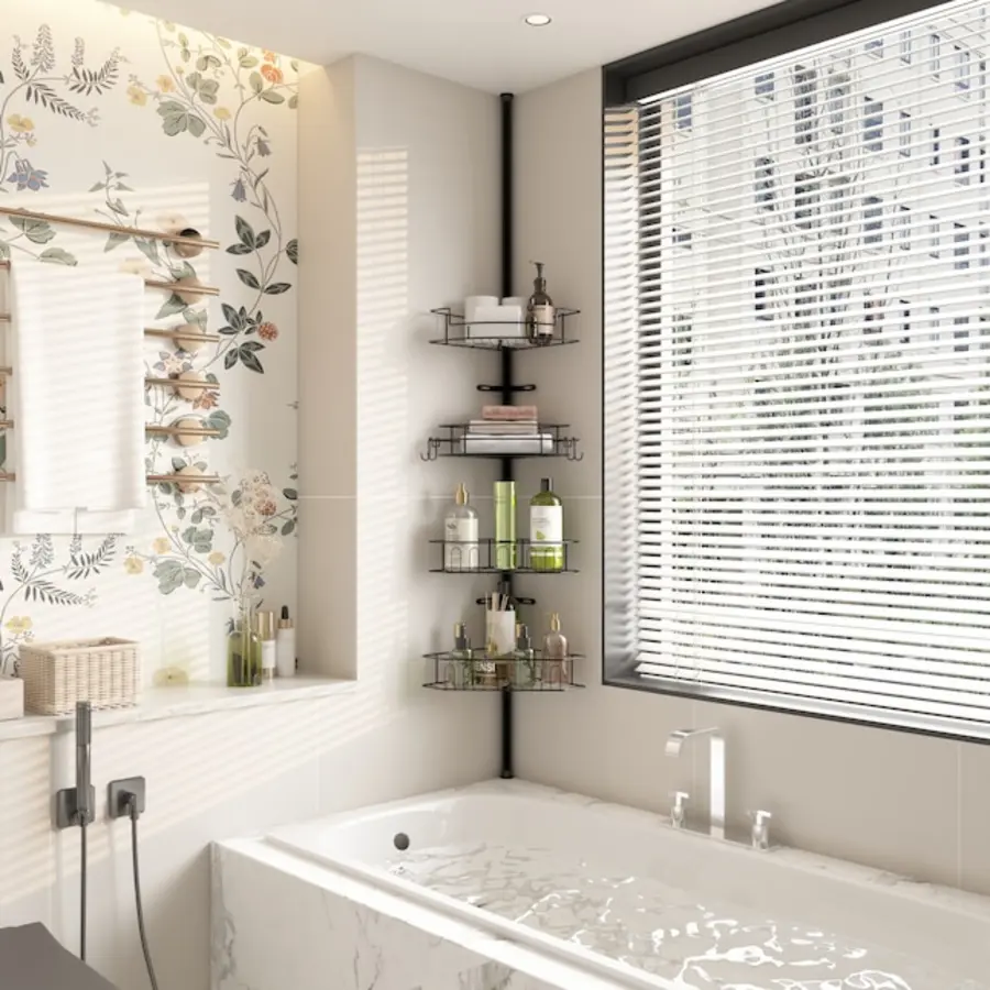 A bathroom with a bathtub, wall decor, and a shower caddy holding various bathroom products.