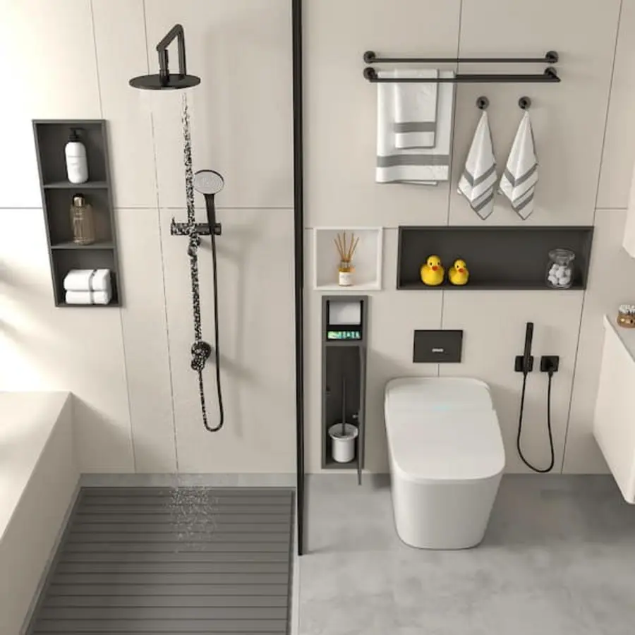 Modern bathroom featuring a discreet toilet brush holder beside a white toilet.
